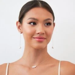 Everett Long Pearl Drop Earrings 8 Everett Long Pearl Drop Earrings -Wedding Dress Store BIRDY GREY EVERETT EARRINGS GOLD RT 02