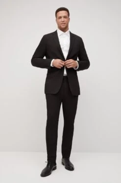 Classic Black Suit By SuitShop -Wedding Dress Store black suitshop groomsmen suit 01 d4dc03ad 6bcf 4ce9 b923 f52e240e7a55