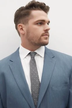 Light Blue Groomsman Suit By SuitShop -Wedding Dress Store light blue suitshop groomsmen suit jacket 09